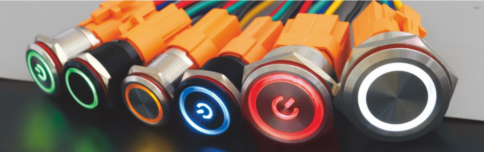 Metal panel buttons with illuminated rings and wiring